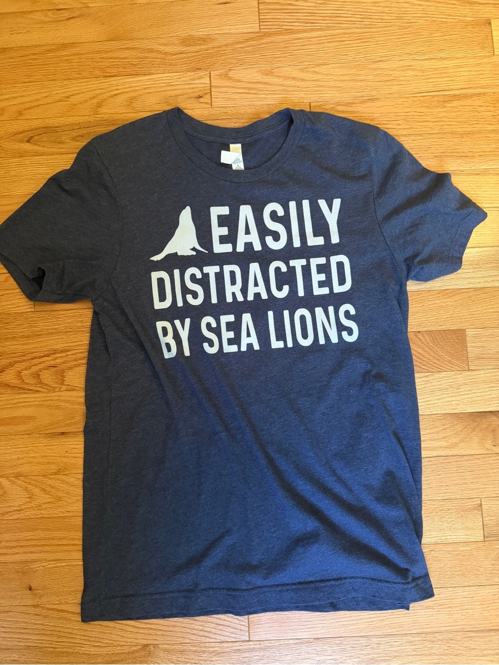 Bella Canvas Navy Blue 'Easily Distracted By Sea Lions' Graphic Tee